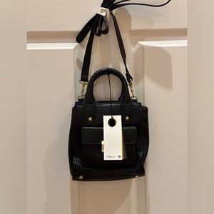Target collaboration with 3.1 Phillip Lim tote bag in black.